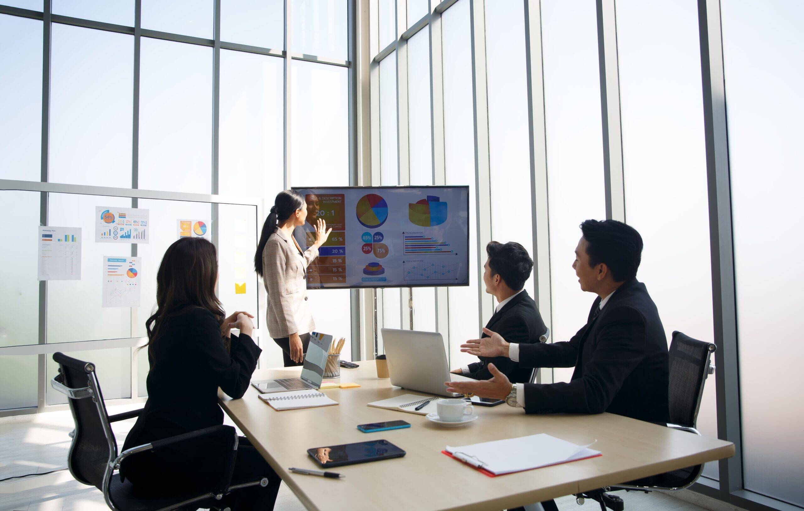 group-of-young-business-people-discussing-and-list-2023-11-27-05-37-03-utc-scaled.jpg