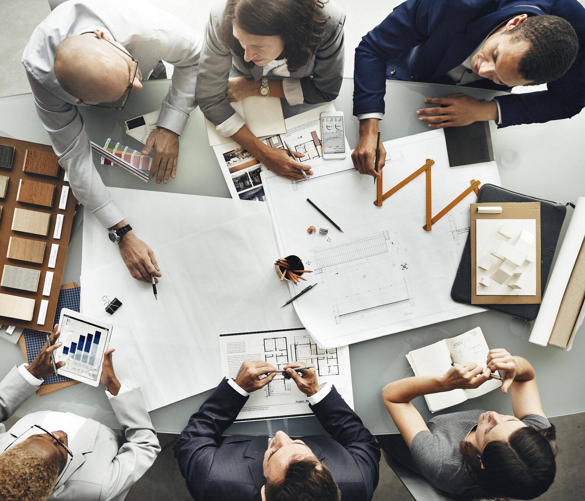 business-people-planning-blueprint-architecture-co-2025-02-09-23-51-41-utc-min.jpg