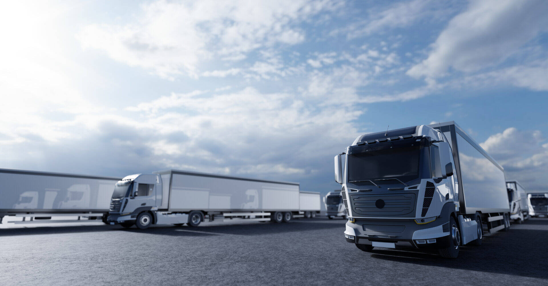 rows-of-semi-trucks-parked-under-cloudy-sky-2026-03-25-00-00-11-utc.jpg