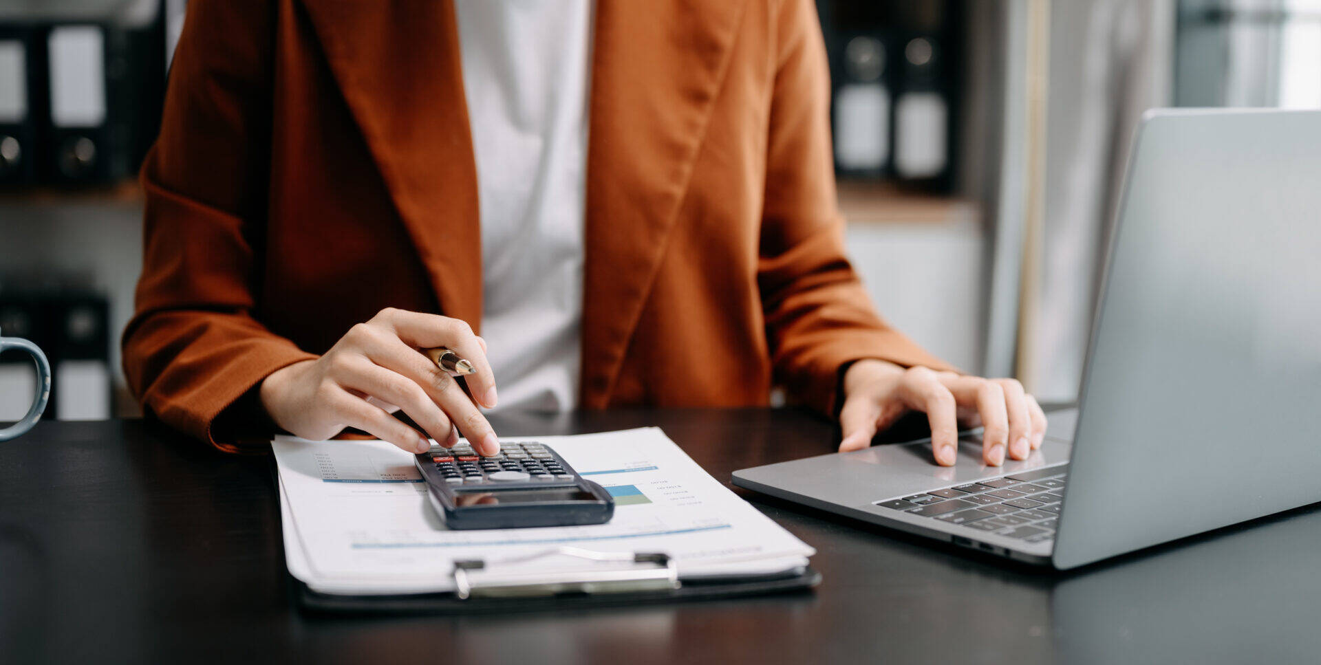 close-up-of-businesswoman-or-accountant-hand-typin-2026-01-05-23-25-28-utc.jpg