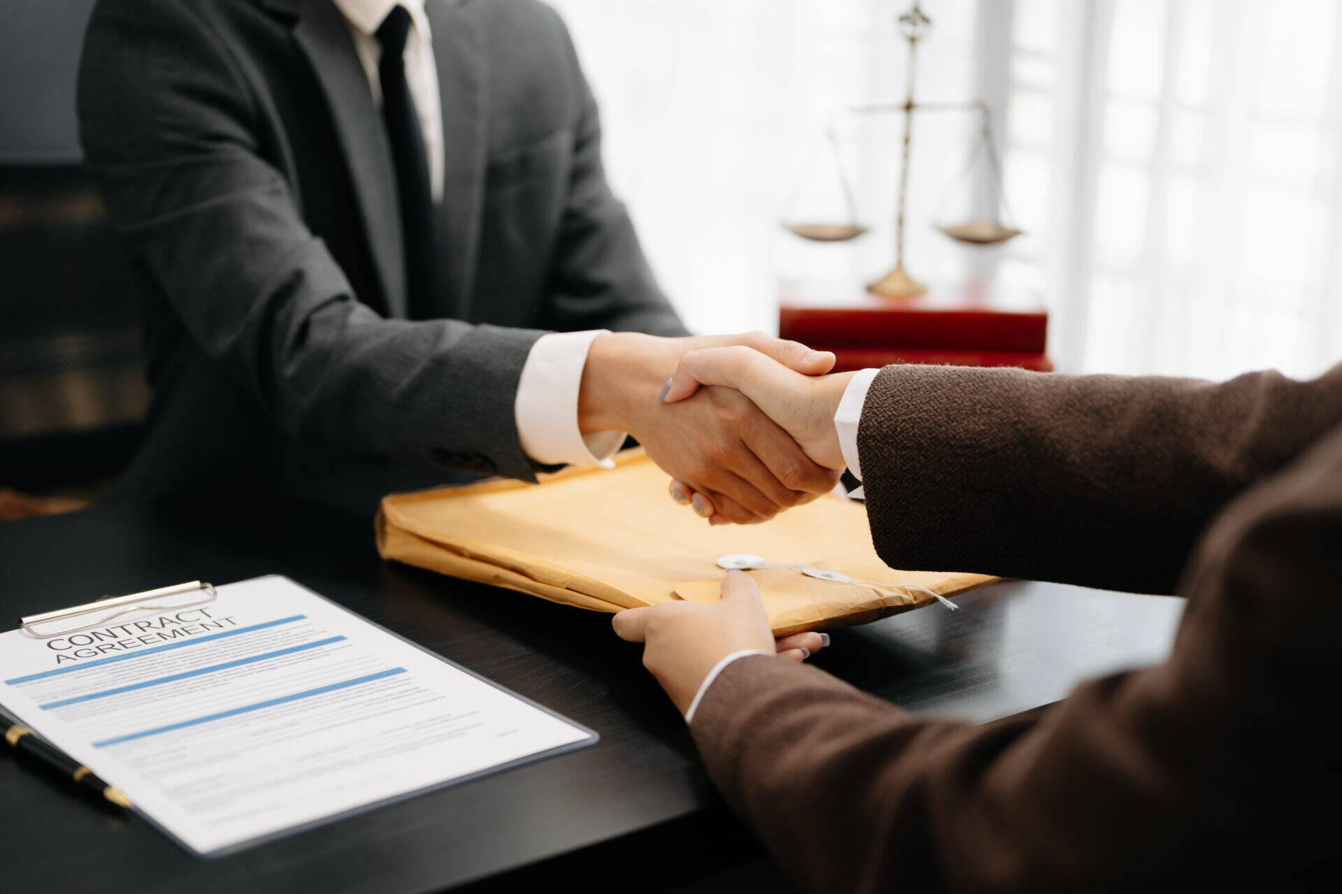 business-handshake-over-contract-agreement-on-offi-2026-09-22-06-05-39-utc.jpg