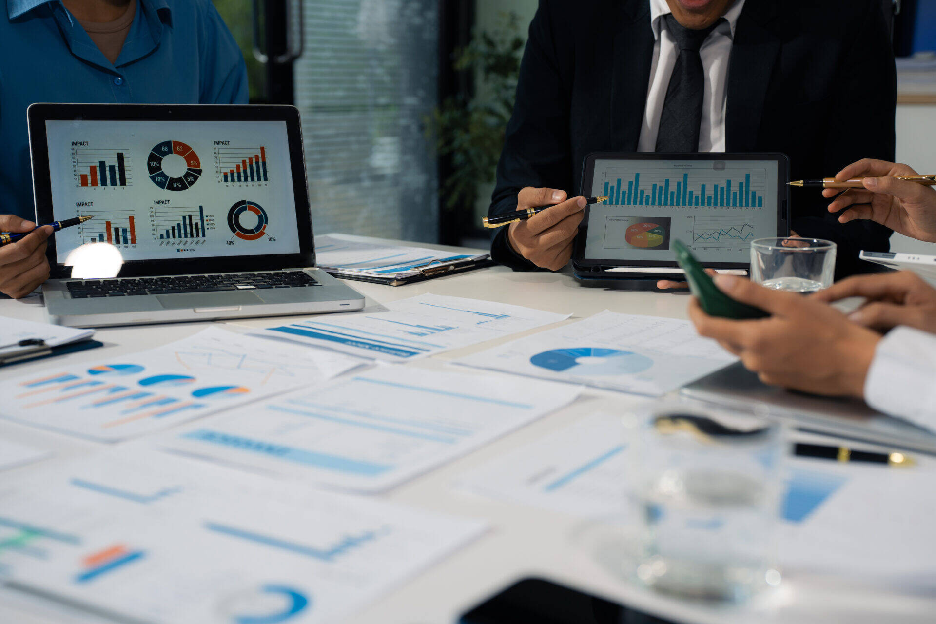business-professionals-discussing-data-charts-at-m-2026-09-22-00-59-43-utc.jpg