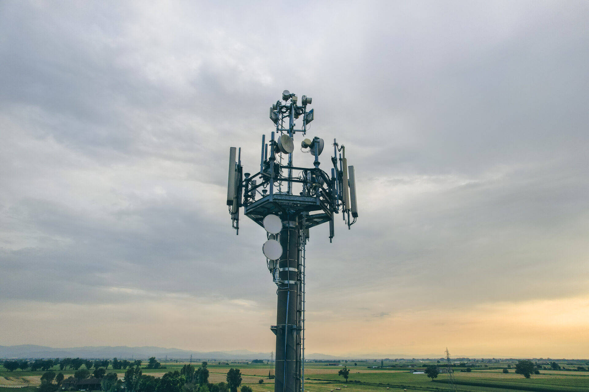 cell-tower-over-green-fields-at-sunset-2026-09-23-17-37-39-utc.jpg